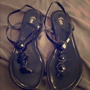 Black beaded detail flip flops